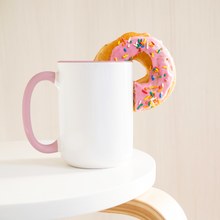 Load image into Gallery viewer, 15oz_Pink_Accent_Mug_Lifestyle_Donut_LH_Mockup.png_15745991