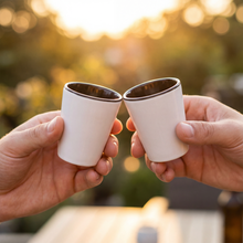 Load image into Gallery viewer, Ceramic_Shot_Glass_-_Black_Accent_Black_Lifestyle_01_Cheers_Mockup.png_15746318